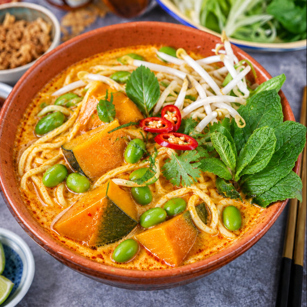 Vegetable Nyonya Laksa with Spiced Roasted Pumpkin, Edamame and Tofu Puffs